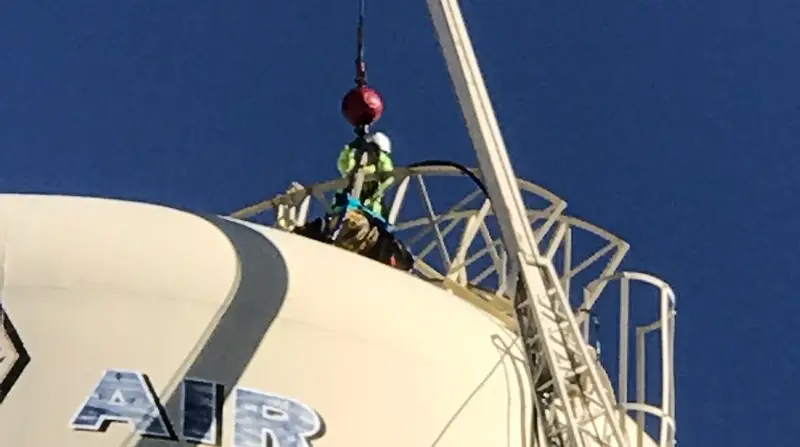 Alliance crew working at height on an Air Force water tower